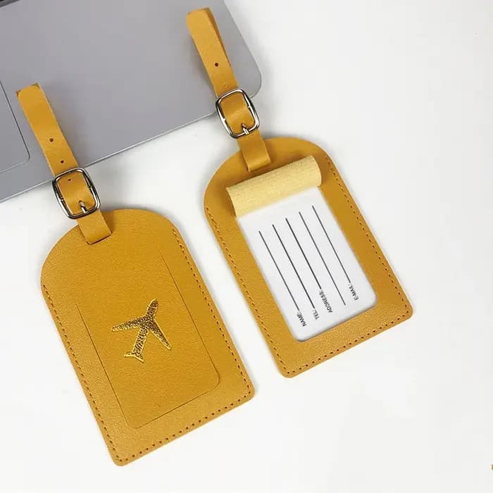 Étiquette de bagage professionnelle en cuir estampillée avec clip d'identification pour valise de vo