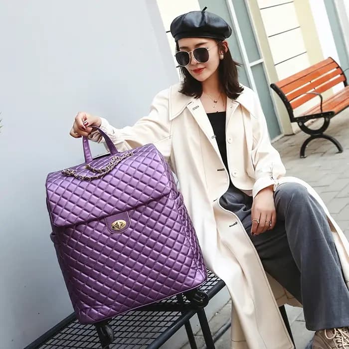 Valise à roulettes avec roues silencieuses universelles