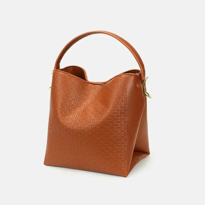 Sac seau CH Monogram avec poignée supérieure et bandoulière amovible pour le quotidien