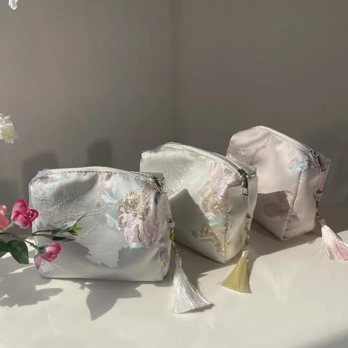 Sac à cosmétiques élégant à fleurs pour femmes