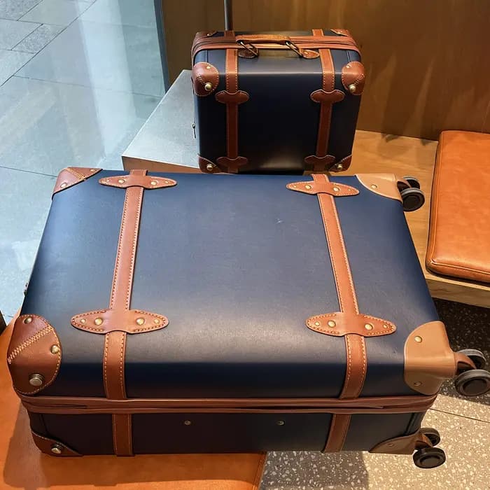 Valise de voyage vintage en cuir bleu pour affaires