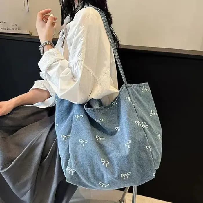 Sac à bandoulière en toile denim avec nœud