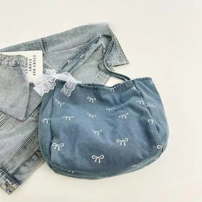 Sac à bandoulière en toile denim avec nœud