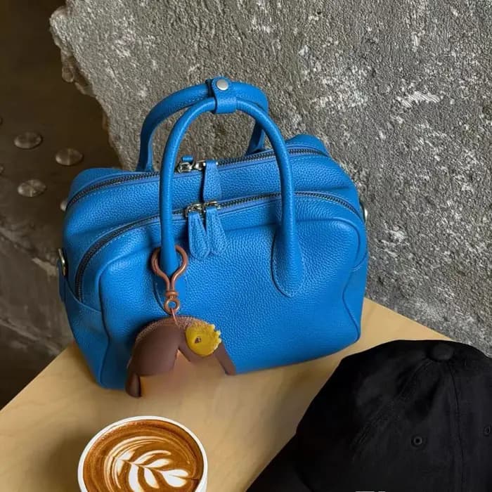 Sac bowling jaune texturé litchi Printemps-Été 2026, polyvalent, à porter à la main, en bandoulière