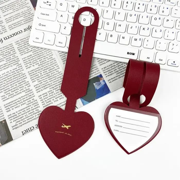 Étiquette de valise d'avion en forme d'amour