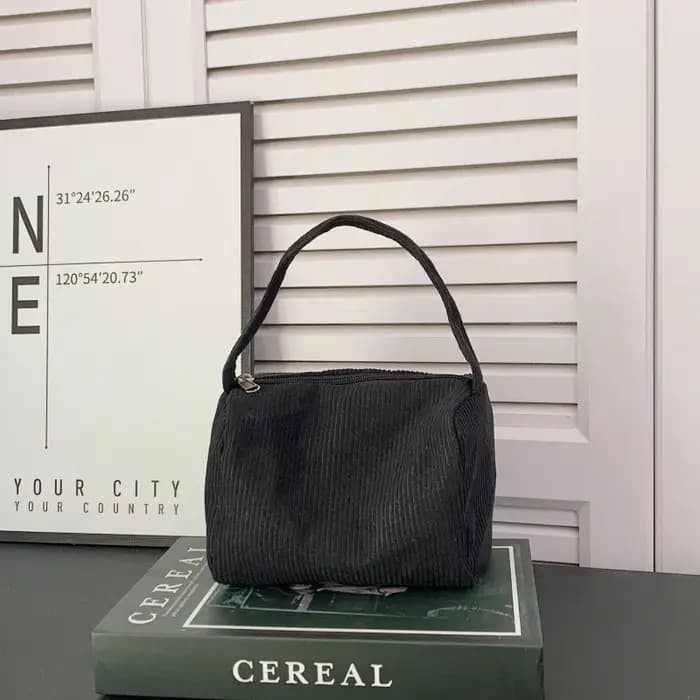 Sac carré compact à porter à la main