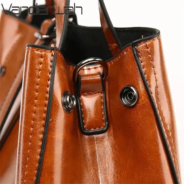 Sacs à main et bourses en cuir verni pour femmes
