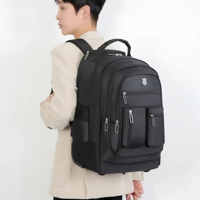 Sac à dos de voyage de grande capacité avec roulettes pour hommes