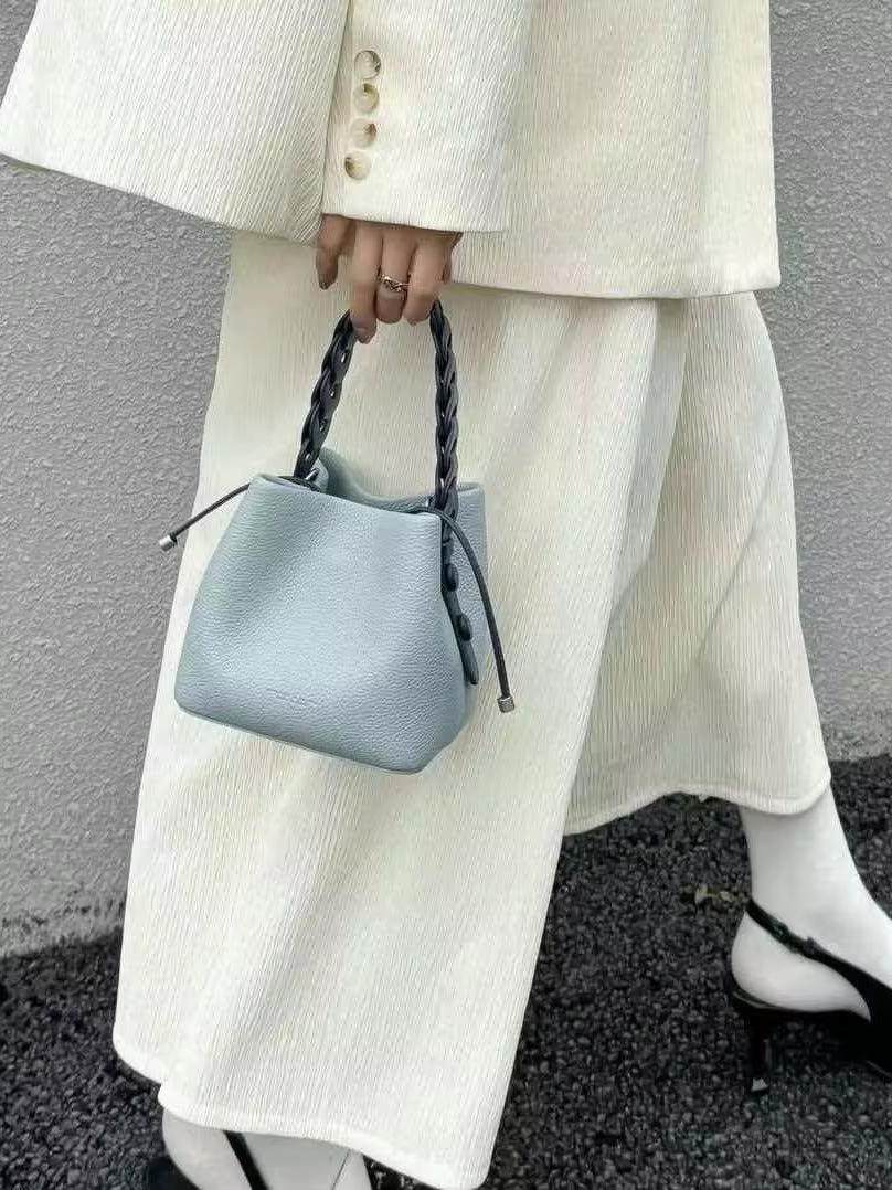 Sac seau en cuir exquis 2026 pour femme – Sac à main tissé haut de gamme polyvalent, design bandouli
