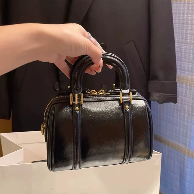 Sac Boston rétro en cuir véritable 2025, marque de Niche à la mode, bandoulière exquise, pratique, M