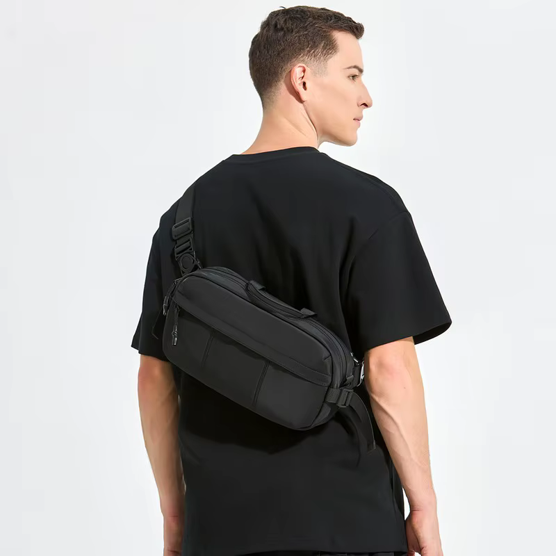 Sac à bandoulière noir, conçu pour les adultes, adapté aux trajets quotidiens, aux courtes promenade