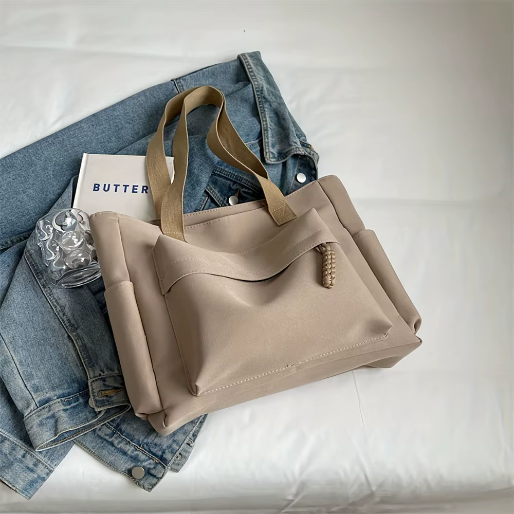 Sac fourre-tout en nylon avec plusieurs poches, design léger et pliable pour les déplacements au bur
