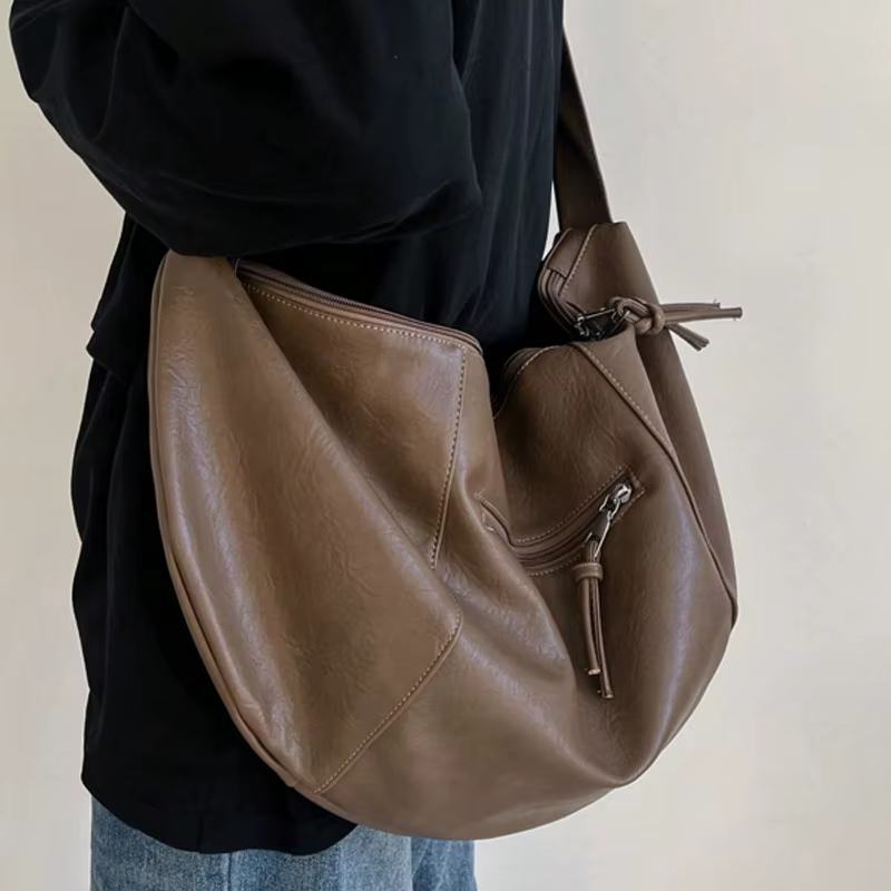Sac à bandoulière élégant en PU en forme de boulette pour hommes, adapté aux sorties décontractées e