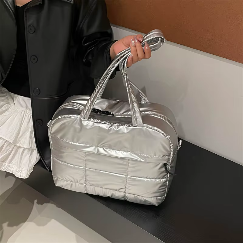 Sac de voyage matelassé de couleur unie